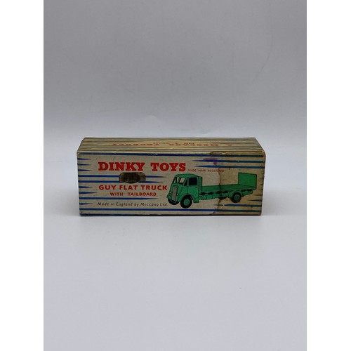 553 - DIE CAST DINKY TOYS - GUY FLAT TRUCK WITH TAIL BOARD 513