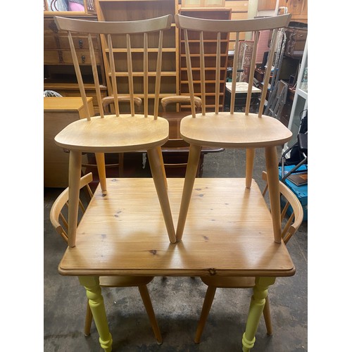 66 - PINE TOPPED YELLOW PAINTED VICTORIAN STYLE KITCHEN TABLE AND FOUR STICK BACK CHAIRS