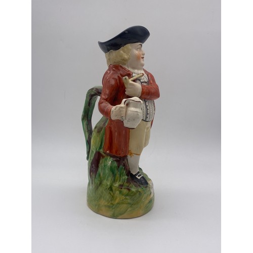 310 - 19TH CENTURY HEARTY GOOD FELLOW TOBY JUG