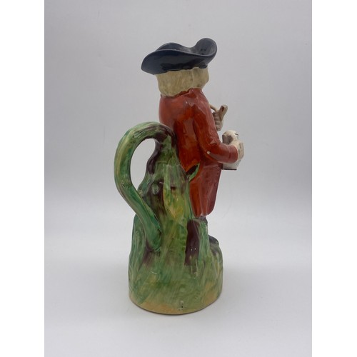 310 - 19TH CENTURY HEARTY GOOD FELLOW TOBY JUG