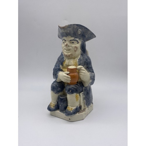 313 - 19TH CENTURY POTTERY SEATED TOBY JUG A/F