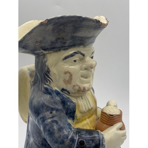 313 - 19TH CENTURY POTTERY SEATED TOBY JUG A/F