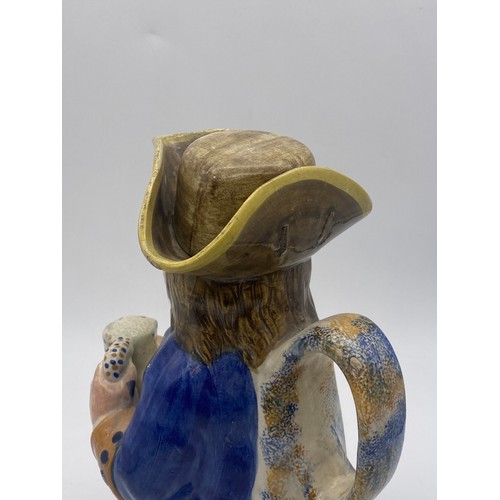 312 - EARLY 19TH CENTURY PRATTWARE TOBY JUG WITH HAT A/F