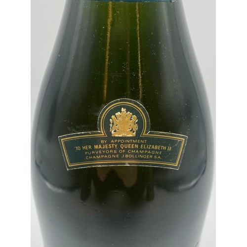 679 - BOTTLE OF BOLLINGER 1975 CHAMPAGNE