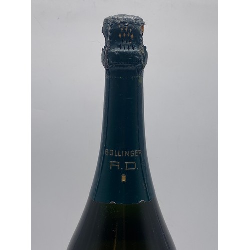 679 - BOTTLE OF BOLLINGER 1975 CHAMPAGNE