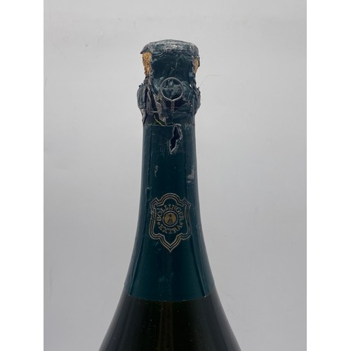 679 - BOTTLE OF BOLLINGER 1975 CHAMPAGNE