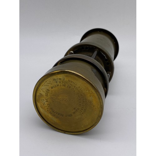 691 - MINIATURE BRASS MINERS TYPE SAFETY LAMP WITH CYRMU BADGE