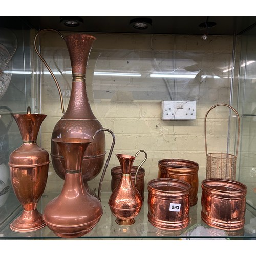 293 - SHELF OF DECORATIVE COPPER EWER VASES AND PLANTERS