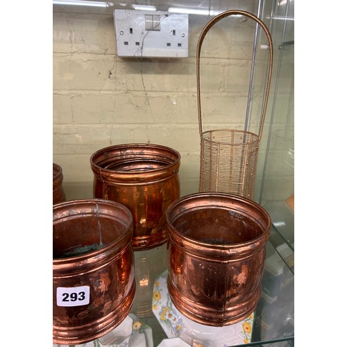 293 - SHELF OF DECORATIVE COPPER EWER VASES AND PLANTERS