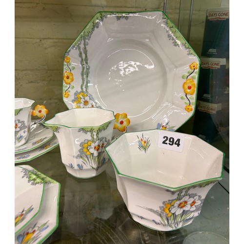 294 - MELBA BONE CHINA THE DELL PATTERN OCTAGONAL TEACUP TRIOS, MILK CREAMER BOWL AND PLATE