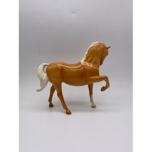 545 - BESWICK GLOSS PRANCING PALOMINO HORSE FIGURE