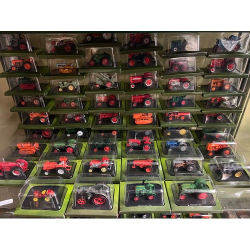 276 - LARGE SELECTION BLISTER PACKED COLLECTION OF MODEL TRACTORS AND FARM VEHICLES WITH ACCOMPANYING MAGA... 