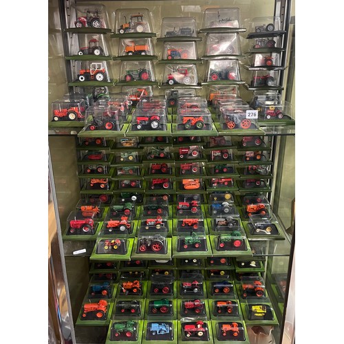 276 - LARGE SELECTION BLISTER PACKED COLLECTION OF MODEL TRACTORS AND FARM VEHICLES WITH ACCOMPANYING MAGA... 