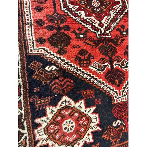 72 - EARLY 20TH CENTURY CAUCASIAN FRINGE CARPET WITH GEOMETRIC PATTERNS