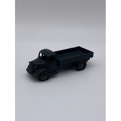 592 - DIE CAST DINKY TOYS - UNBOXED AUSTIN FLAT BED TRUCK (WHEELS AF) & TROJAN 