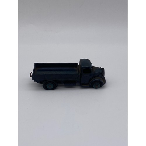 592 - DIE CAST DINKY TOYS - UNBOXED AUSTIN FLAT BED TRUCK (WHEELS AF) & TROJAN 