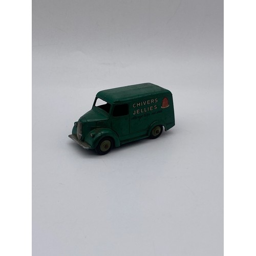 592 - DIE CAST DINKY TOYS - UNBOXED AUSTIN FLAT BED TRUCK (WHEELS AF) & TROJAN 