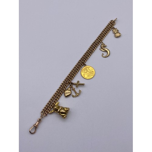 436 - 9CT GOLD FLAT CURB LINK CHARM BRACELET WITH SWIVEL FASTENER INCLUDING A GEORGE V 1913 HALF SOVEREIGN... 