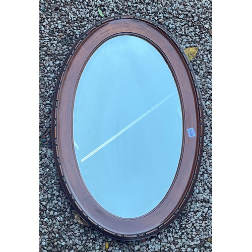 530 - MAHOGANY EGG AND DART MOULDED FRAMED OVAL MIRROR