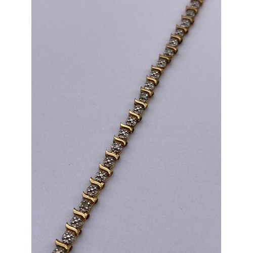 406 - 9CT GOLD CZ CHIP TENNIS BRACELET 19CM APPROX 4.3G APPROX