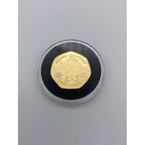 387 - POBJOY MINT 22CT GOLD PROOF LIMITED EDITION 1991 FATHER CHRISTMAS 50 PENCE PIECE 8G APPROX