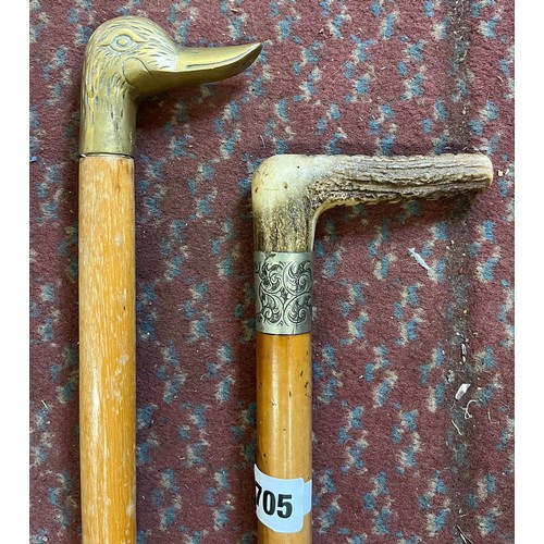 705 - BRASS DUCKS HEAD WALKING CANE AND A HORN HANDLED EPNS MOUNTED CROP CANE