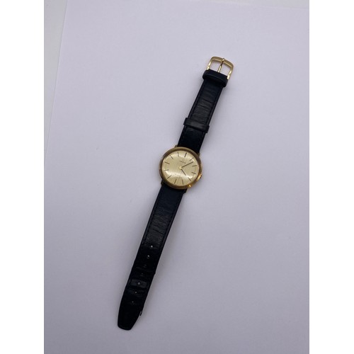 725 - BOXED 9CT GOLD OMEGA DEVILLE ON LEATHER STRAP