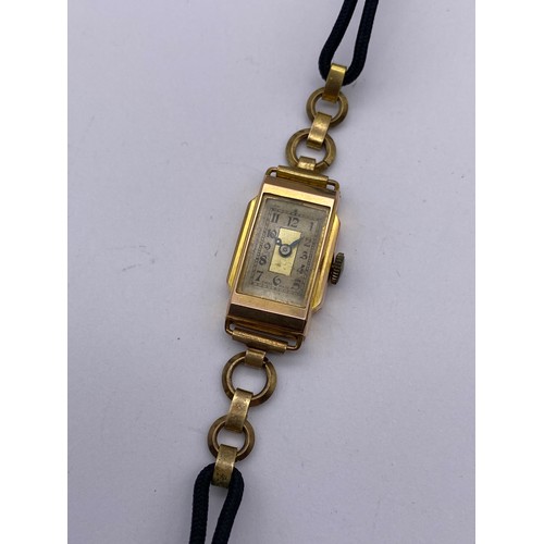 731 - 9CT GOLD LADIES RECTANGULAR FACED WRISTWATCH ON A ROPE AND METAL STRAP IN BOX