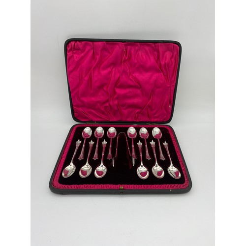 709 - CASED SET OF 12 SHEFFIELD SILVER TEASPOONS, SUGAR TONGS, A 1937 CORONATION PLATED TEASPOON, AND A CO... 