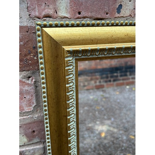 671 - GILT RECTANGULAR HALL MIRROR