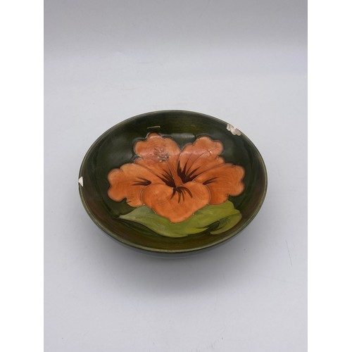 602 - MOORCROFT POTTERY HIBISCUS PATTERN BOWL, PAIR OF PIN DISHES AND SHALLOW BOWL (RIM A/F)