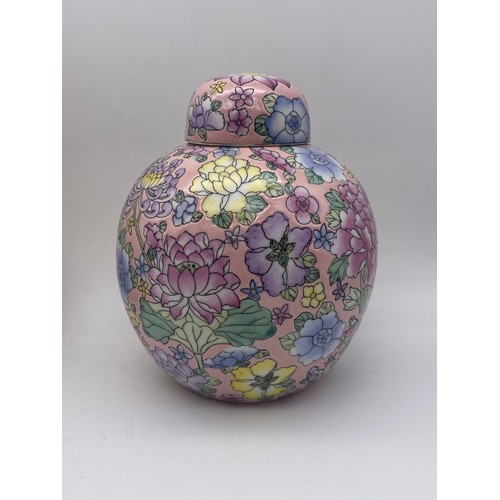 303 - PAIR OF 20TH CENTURY CHINESE GLOBULAR JARS AND COVERS DECORATED WITH BLOSSOM AND FLOWERS