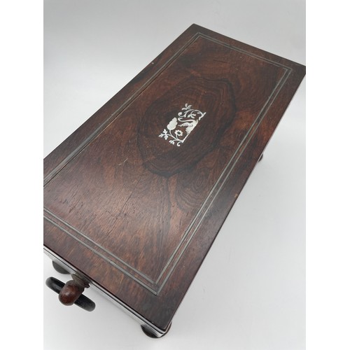 608 - 19TH CENTURY ROSEWOOD MOTHER OF PEARL INLAID RECTANGULAR TEACADDY WITH RING HANDLES ON BUN FEET