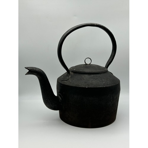 325 - OVERSIZED CAST IRON KETTLE