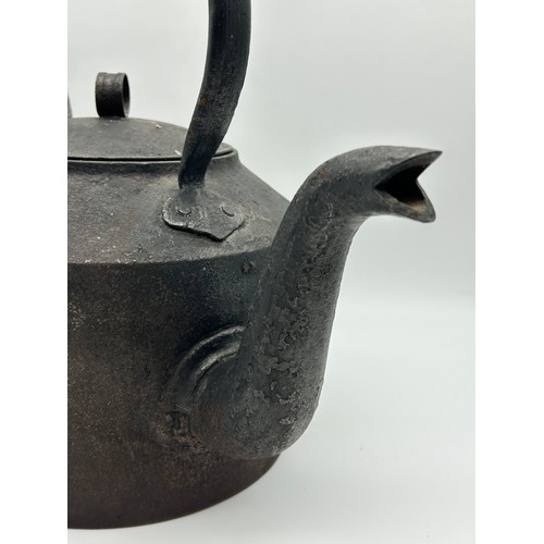 325 - OVERSIZED CAST IRON KETTLE