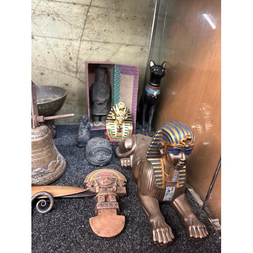 329 - SHELF OF REPRODUCTION EGYPTIAN AND AZTEC SOUVENIR WARES, BRASS OWL, BRASS CHAMBER STICKS, COBRA CAND... 