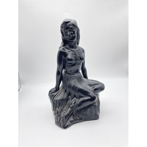 499 - BLACKENED CHALK FIGURE OF A SEATED FEMALE MADE IN NEW ZEALAND