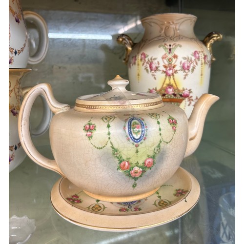 336 - CROWN DEVON BLUSH IVORY FLORAL CHAMBER POTS, VASE AND TEAPOT