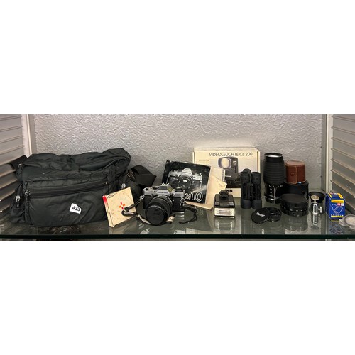 433 - OLYMPUS OM10 FILM CAMERA, NYLON CARRY BAG AND VARIOUS ACCESSORIES