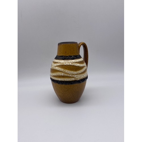 566 - WEST GERMAN POTTERY MUSTARD COLOURED JUG