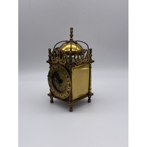 565 - SMITHS BRASS MINIATURE LANTERN STYLE CLOCK