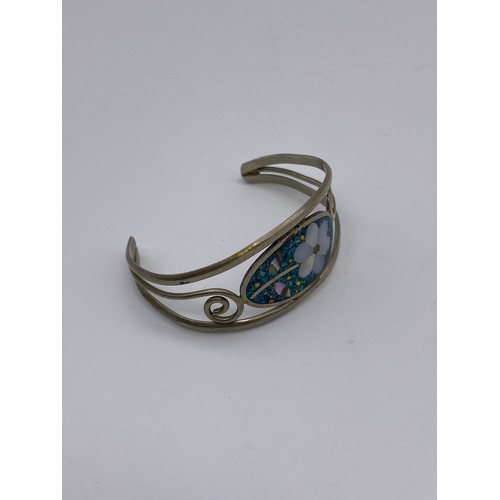 689 - WHITE METAL CABOCHON SET BANGLE, FILIGREE CUFF AND A SERPENT COIL BANGLE