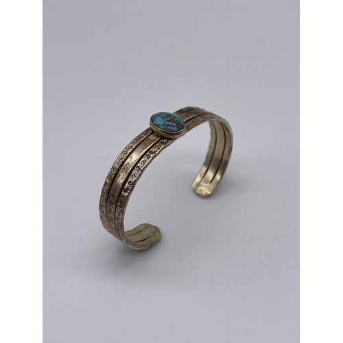 689 - WHITE METAL CABOCHON SET BANGLE, FILIGREE CUFF AND A SERPENT COIL BANGLE