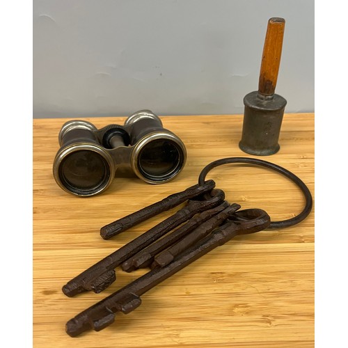 496 - PAIR OF BINOCULARS, SET OF CAST IRON KEYS, AND SMALL BELL