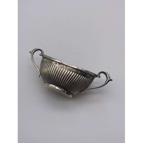 505 - BIRMINGHAM SILVER MINATURE JUG AND PAIR OF BOAT SHAPED TWIN HANDLED TABLE SALTS 2OZ OVERALL APPROX