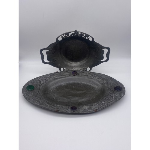 560 - TUDRIC ART NOUVEAU PEWTER TWIN HANDLED BOWL DECORATED WITH CLOVERS AND AN ARTS AND CRAFTS PEWTER OVA... 