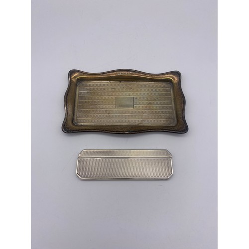 507 - BIRMINGHAM SILVER SERPENTINE RECTANGULAR TRAY AND A SILVER CASED COMB 2.4OZ OVERALL APPROX