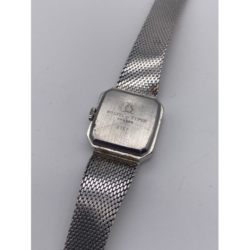 676 - LADIES TITUS 17 JEWELLS STAINLESS STEEL OCTAGONAL FACED WRISTWATCH ON TEXTURED STRAP