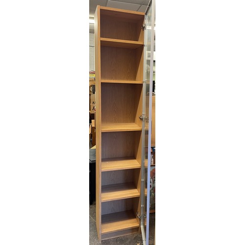 23 - TWO LIGHT OAK GLAZED FRONT TOWER DISPLAY CABINETS