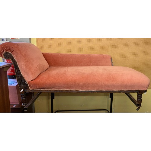 221 - EDWARDIAN CARVED OAK FRAMED PINK UPHOLSTERED CHAISE LOUNGE